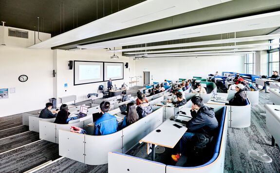 Students studying in a lecture theatre